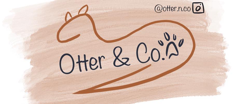 A logo representation for the company Otter & Co. There is a curved thick modern styled outline of an otter. The head to tail wrap around the words Otter & Co. with a paw print at the end of the words.
In the top corner is a name for her instagram account @otter.n.co with a camera at the end representing the instagram reference.