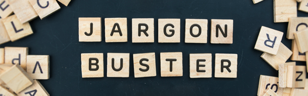 "Jargon Buster" made from and surrounded by Scrabble-style tiles
